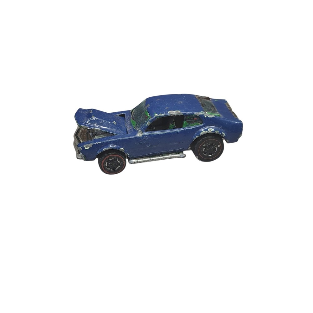 Hot Wheels Redlines mighty maverick kid painted